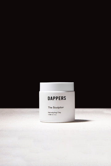 The Sculptor Haistyling Clay